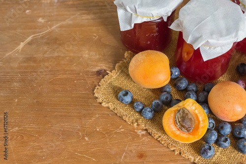 Apricose, blueberry and strawbery jam photo