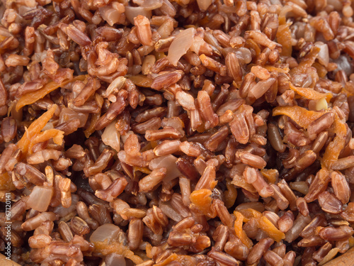 Prepared Red rice with onion and carrot