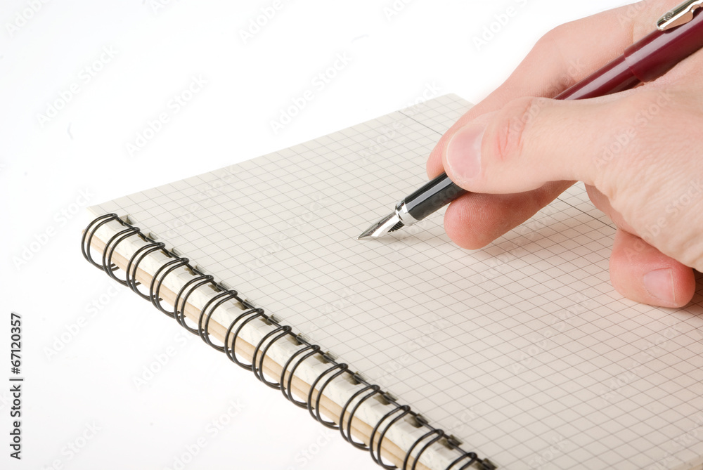 Hand writing on empty notepad (notebook) isolated on white