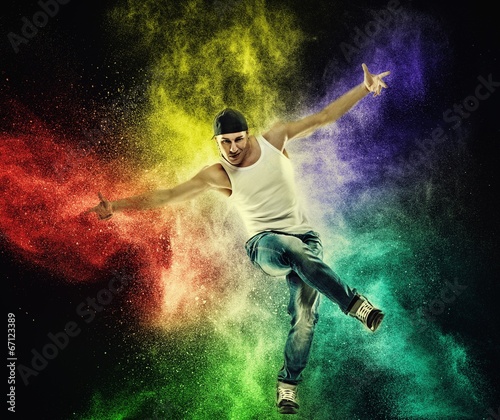 Man dancer showing break-dancing moves   © Nejron Photo