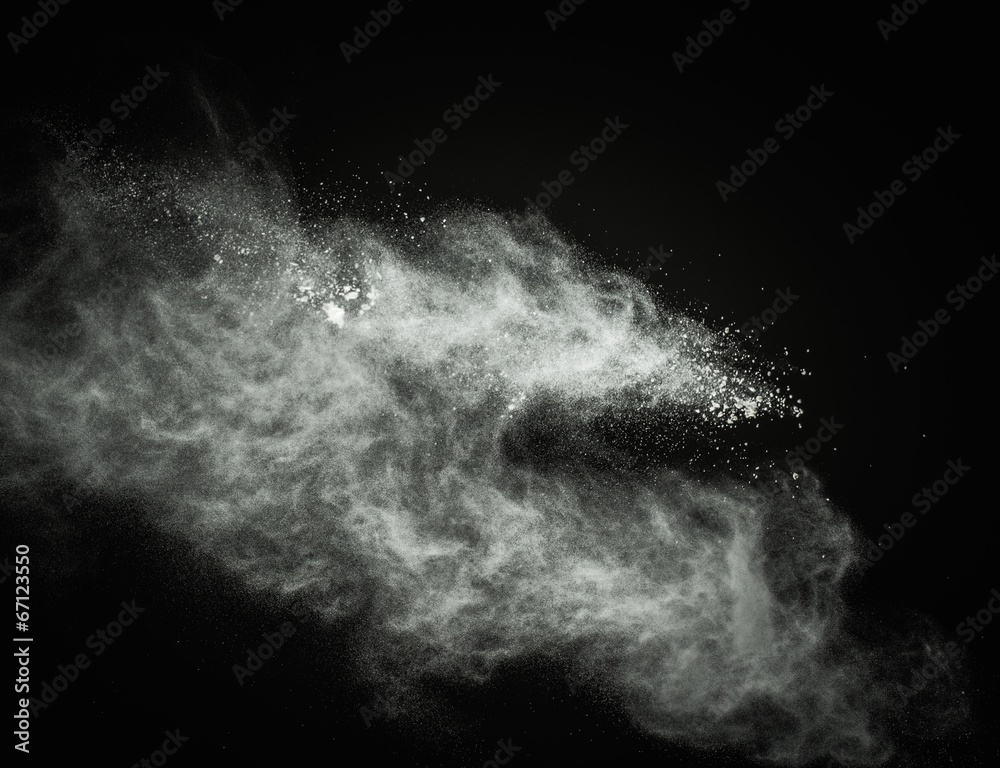 Fototapeta premium White powder exploding isolated on black