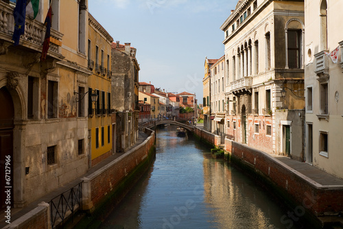 Canal, bridge and ancient buildings in Venice.