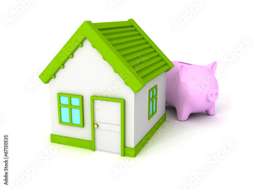 Piggy Bank with green roof house on white photo