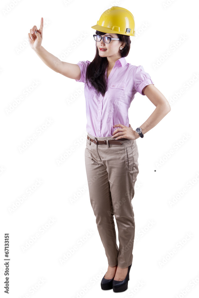Female enginner pressing something Female enginner pressing something