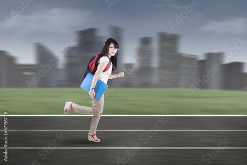 Student running on tracks 1 © Creativa Images