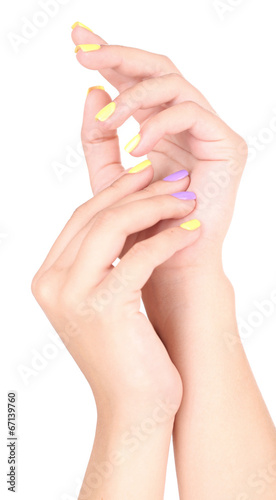 Female hands with stylish colorful nails  isolated on white