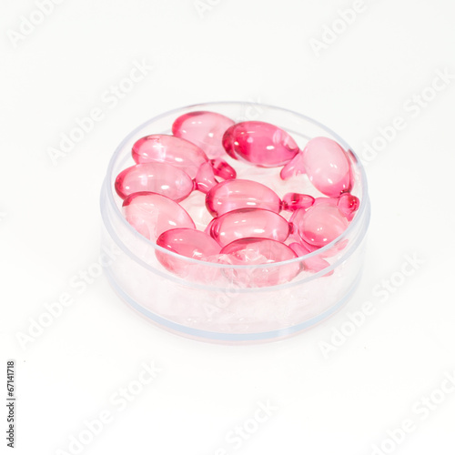 gelatin pills on white background