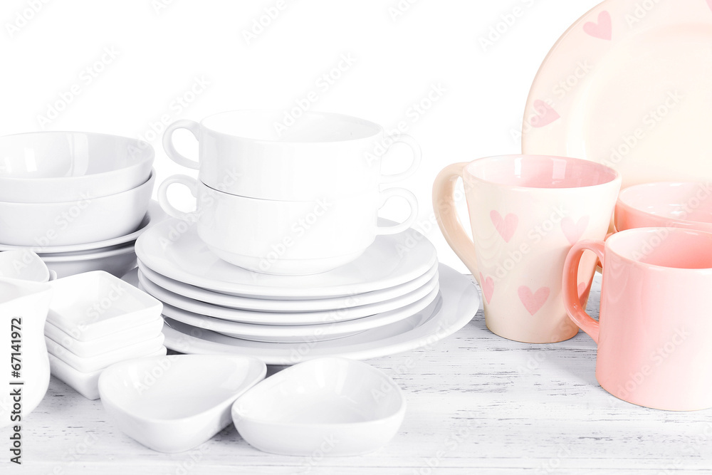 Fototapeta premium Different tableware on shelf, isolated on white