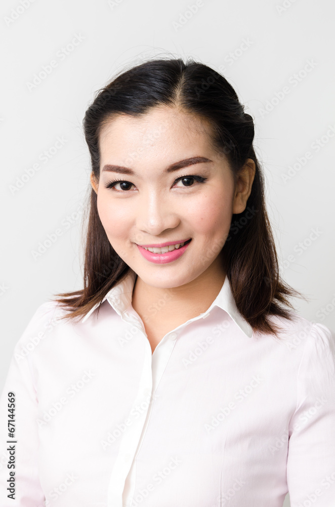 Portrait of smiling business woman, isolated on white background Portrait of smiling business woman, isolated on white background