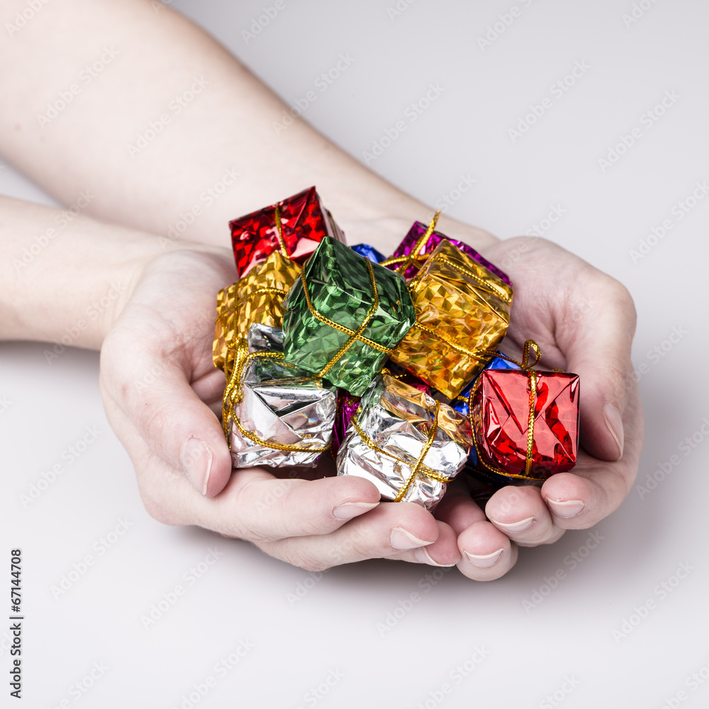 christmas gifts in woman hand christmas gifts in woman hand