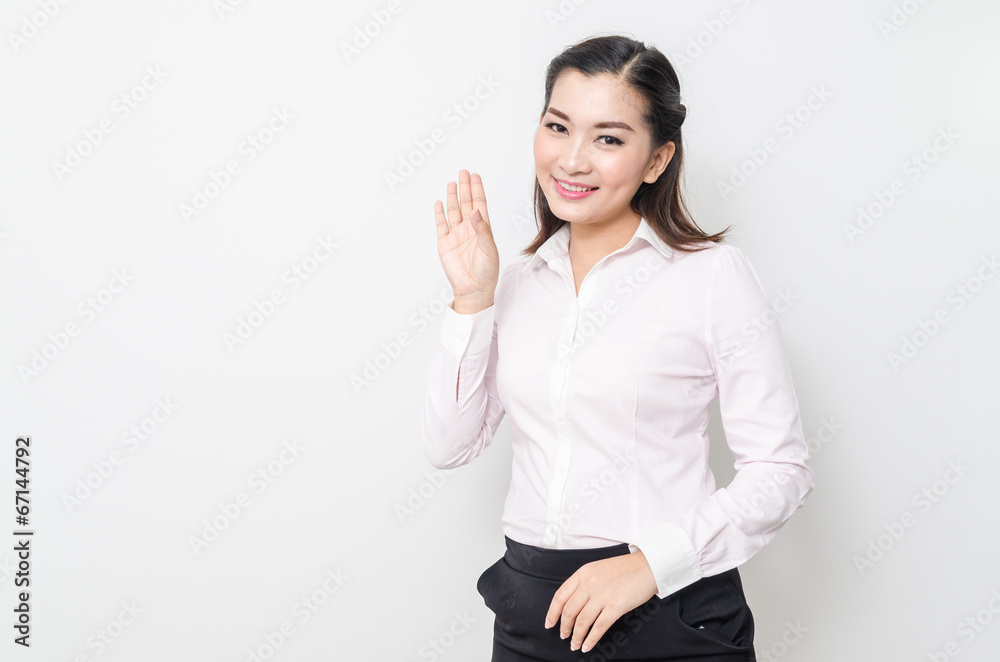 Portrait of smiling business woman, isolated on white background