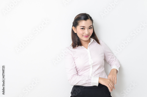 Portrait of smiling business woman, isolated on white background