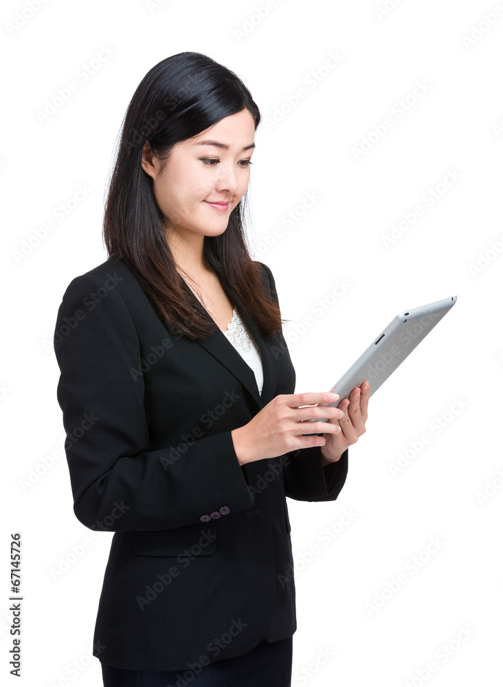 Business woman look at digital tablet Business woman look at digital tablet