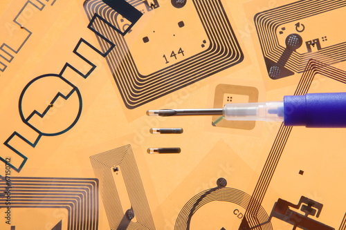 RFID implantation syringe and chips on RFID tags