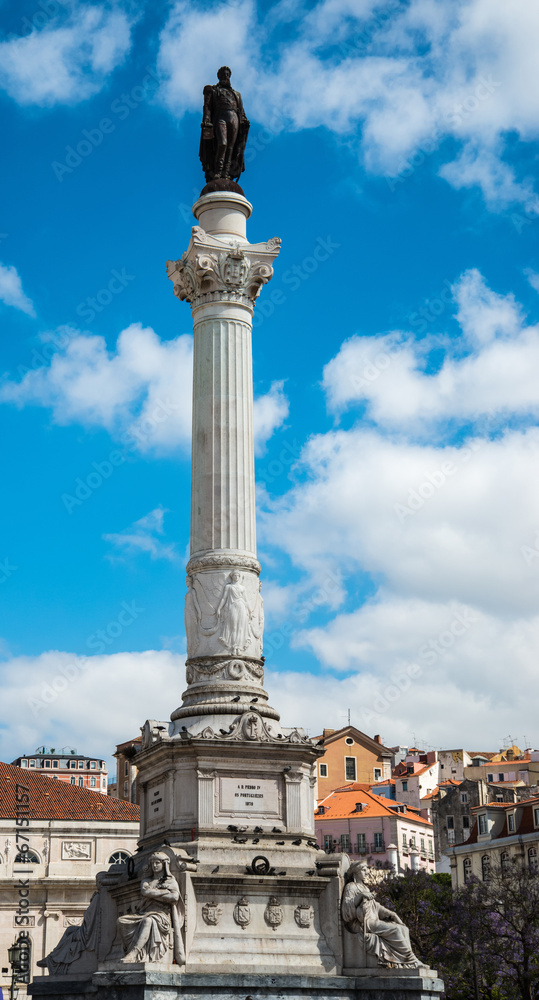 Rossio square with fountain located at Baixa district in Lisbon,