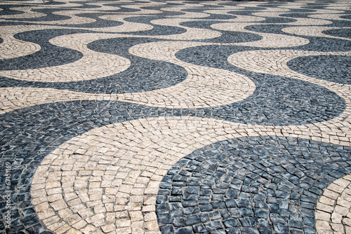Typical Portuguese "calcada" mosaic cobble stone paving, Lisbon,