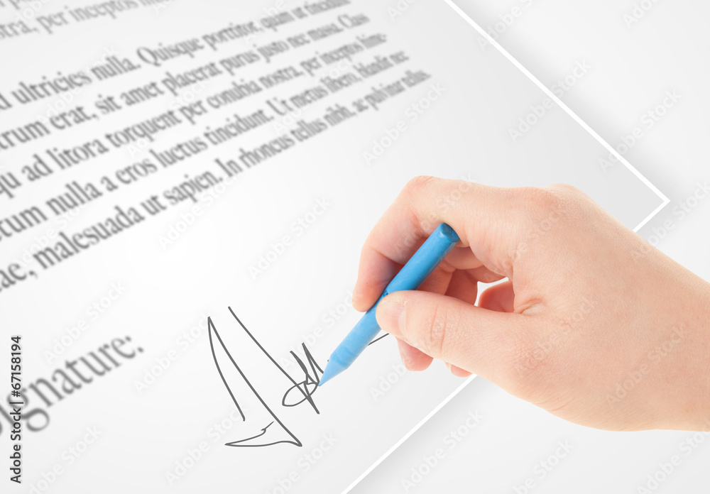Hand writing personal signature on a paper form Hand writing personal signature on a paper form
