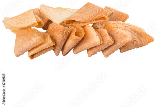 Kuih Kapit or the  Chinese Love Letter biscuit over white  photo