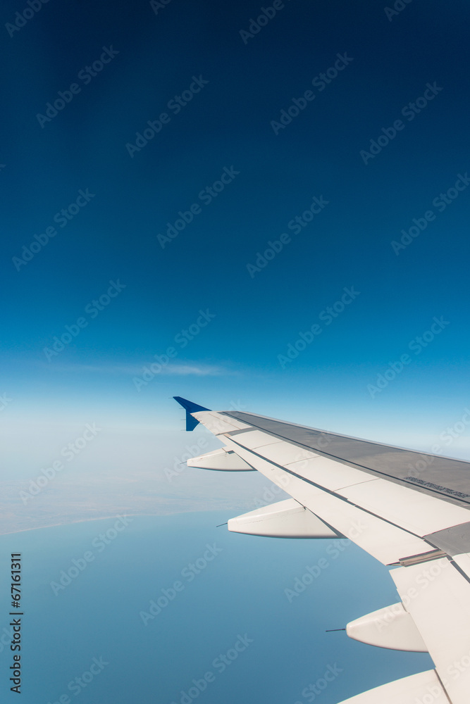 Fototapeta premium Airplane wing out of window
