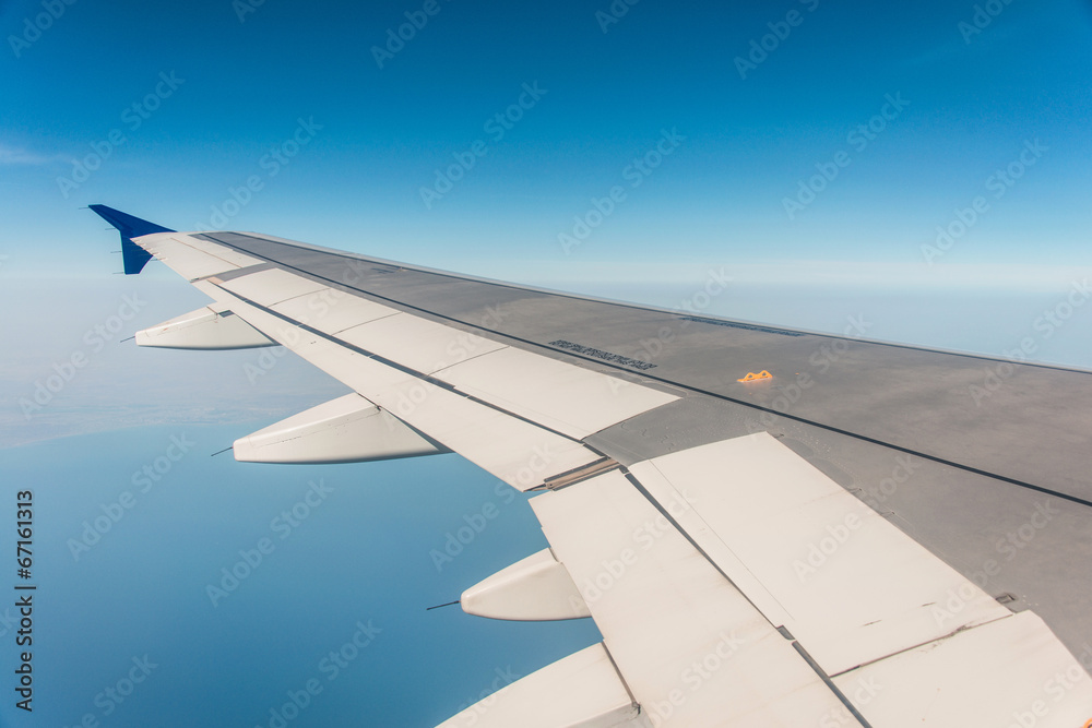 Airplane wing out of window