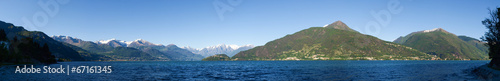 Panorama of the Lake of Como from the Beach at evening sunlight