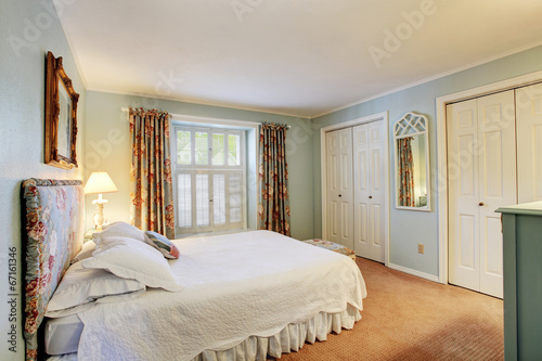 Soft tones bedroom interior in old house
