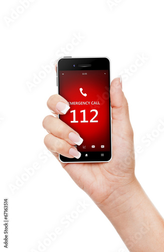 hand holding mobile phone with emergency number 112
