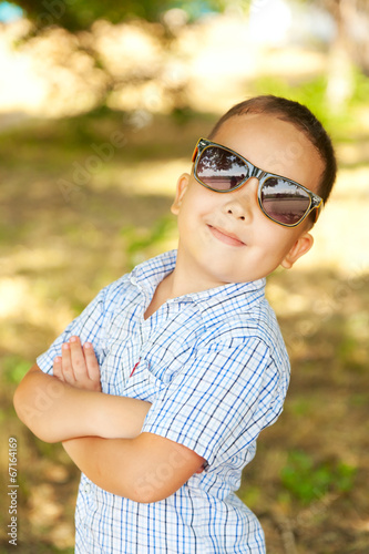 Asian boy 6 years old in sunglasses