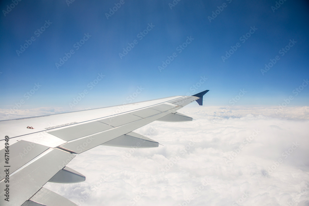 Airplane wing out of window Airplane wing out of window