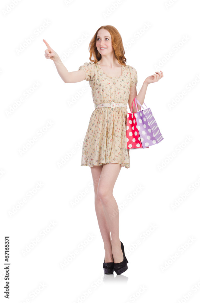 Woman with shopping bags isolated on white Woman with shopping bags isolated on white