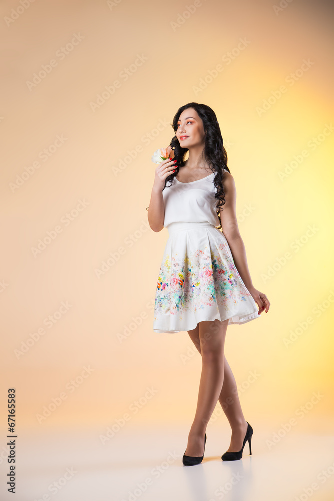 Romantic beautiful woman wearing white dress