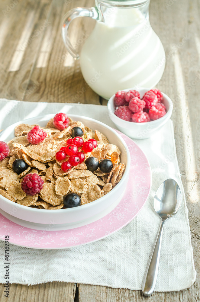 Wholegrain granola with milk and fresh berries Wholegrain granola with milk and fresh berries