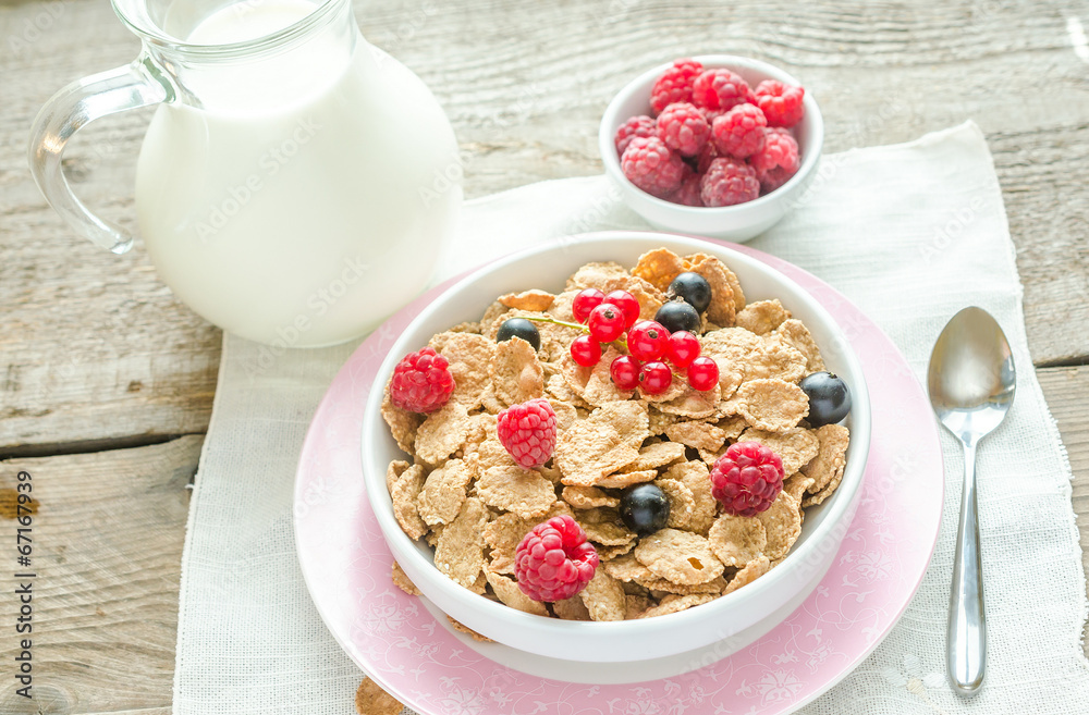Wholegrain granola with milk and fresh berries Wholegrain granola with milk and fresh berries