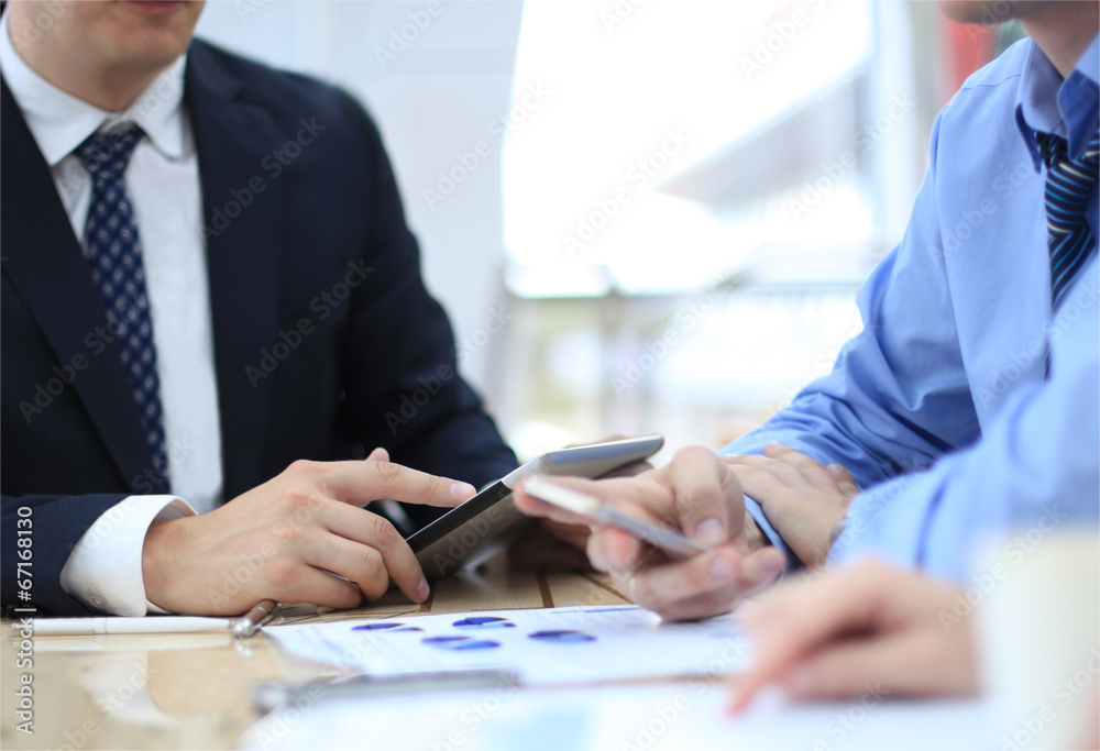 Business adviser analyzing financial figures Business adviser analyzing financial figures