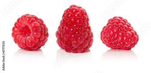 ripe juicy raspberries on the white background