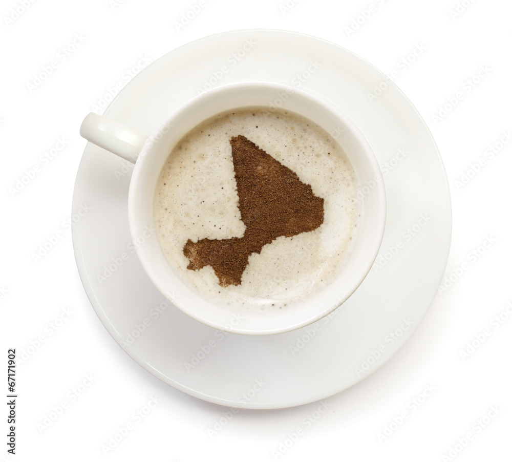 Cup of coffee with foam and powder in the shape of Mali.(series) Cup of coffee with foam and powder in the shape of Mali.(series)