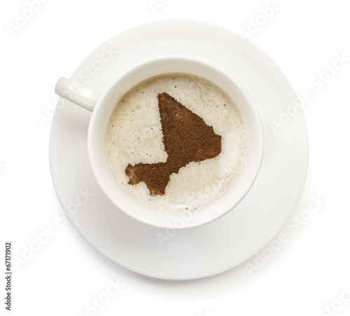 Cup of coffee with foam and powder in the shape of Mali.(series)