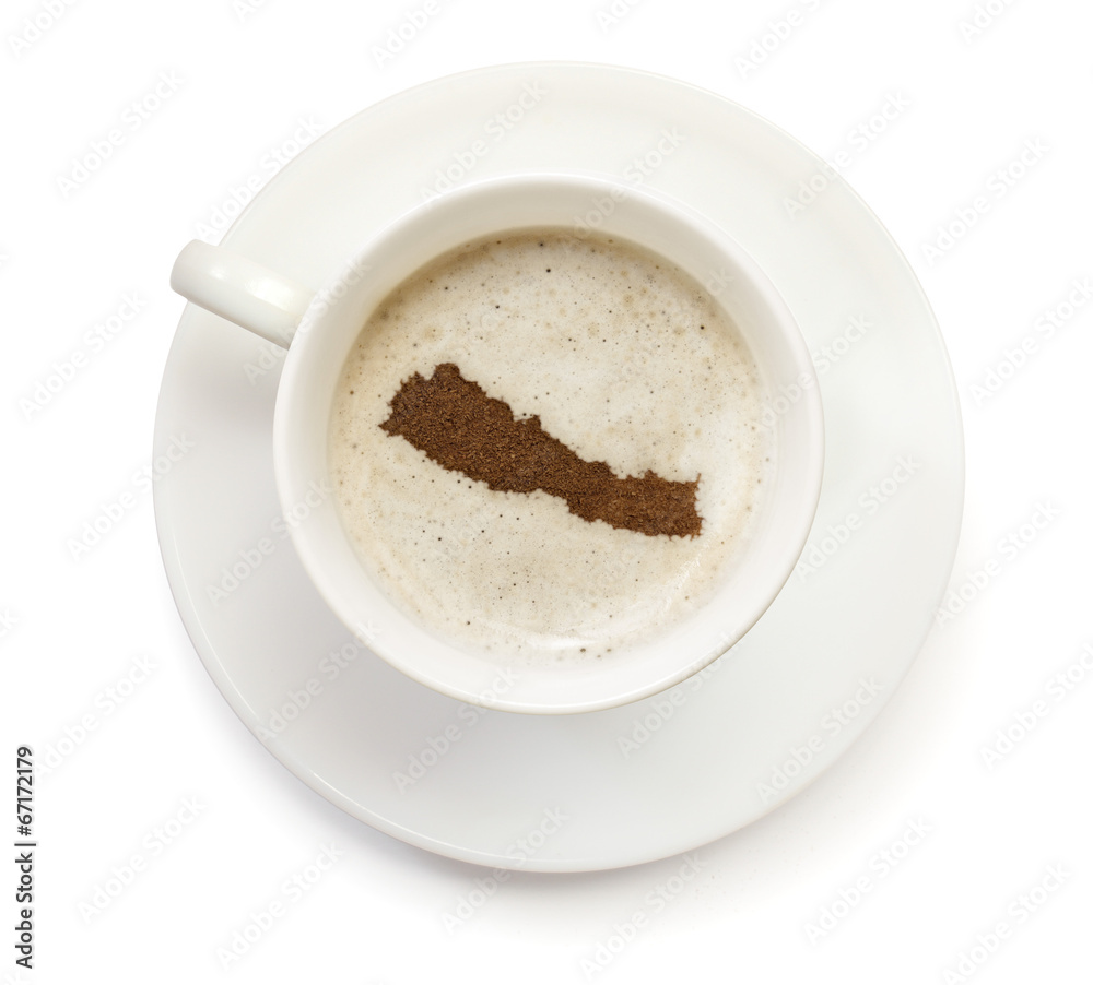 Cup of coffee with foam and powder in the shape of Nepal.(series Cup of coffee with foam and powder in the shape of Nepal.(series