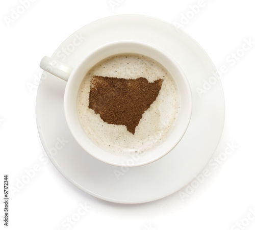 Cup of coffee with foam and powder in the shape of New South Wal