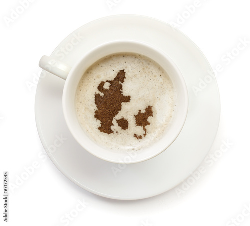 Cup of coffee with foam and powder in the shape of Denmark.(seri