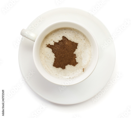 Cup of coffee with foam and powder in the shape of France.(serie