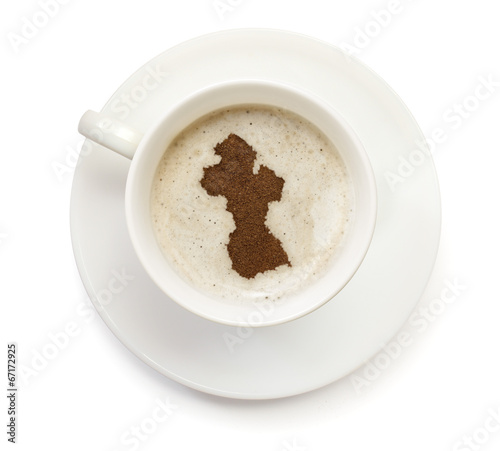Cup of coffee with foam and powder in the shape of Guyana.(serie