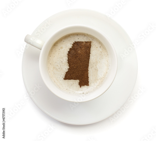 Cup of coffee with foam and powder in the shape of Mississippi.(