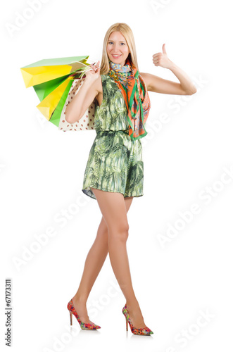 Woman after shopping spree on white