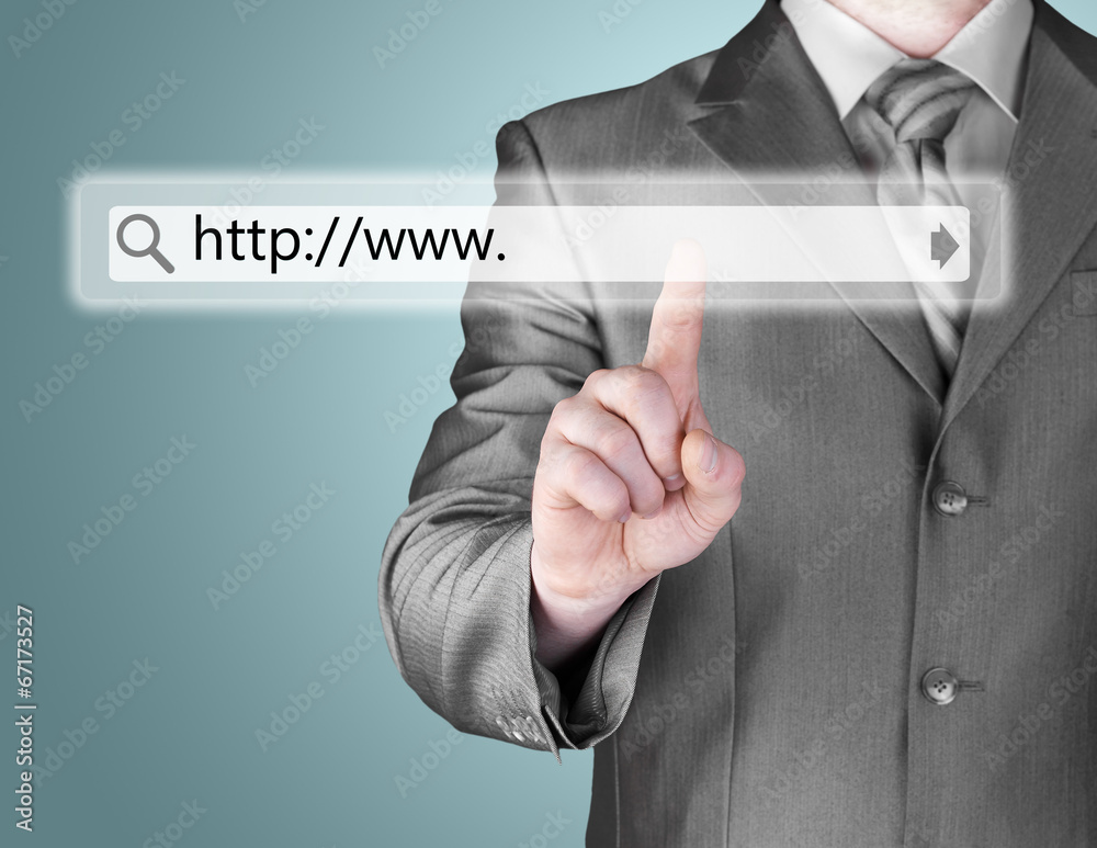 Businessman pushing virtual search bar Businessman pushing virtual search bar