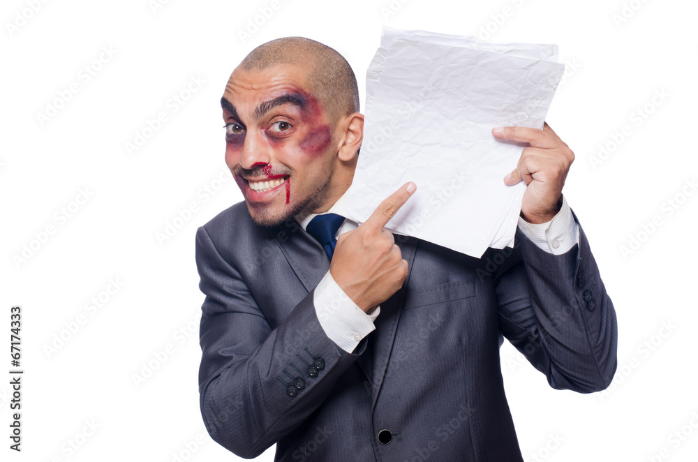 Badly beaten businessman isolated on white