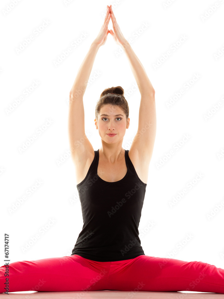 Flexible girl doing stretching pilates exercise Flexible girl doing stretching pilates exercise