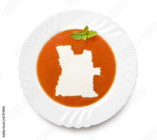 Plate tomato soup with cream in the shape of Angola.(series)