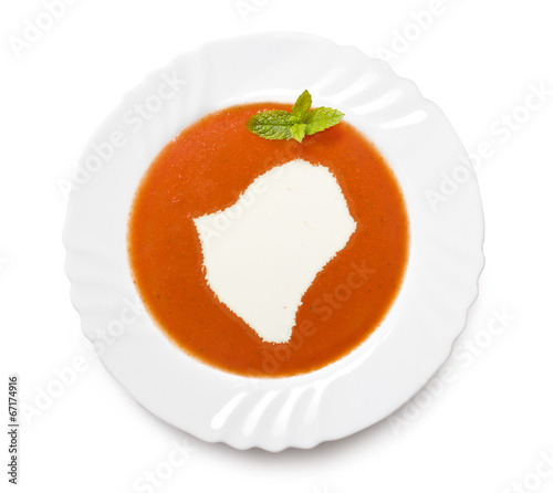 Plate tomato soup with cream in the shape of Burundi.(series)