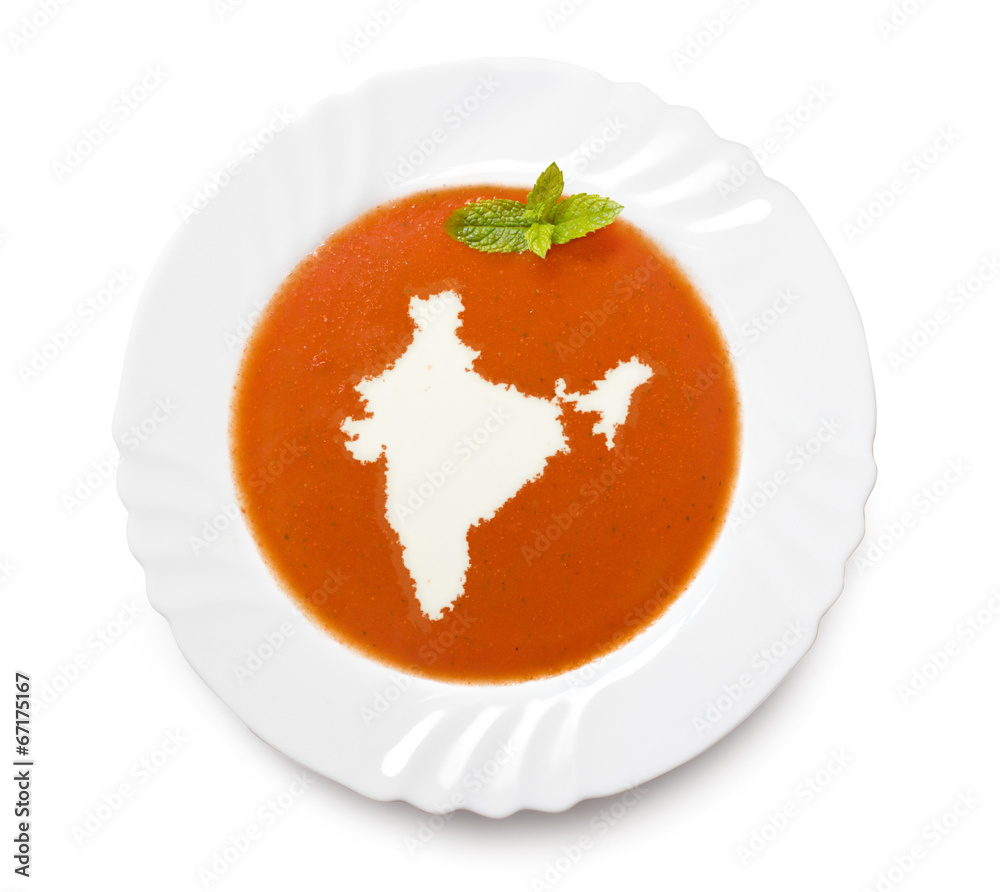 Plate tomato soup with cream in the shape of India.(series) Plate tomato soup with cream in the shape of India.(series)